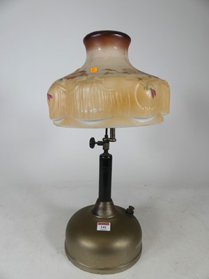 Lot 141 - A Coleman Quick-lite table lamp, having a...