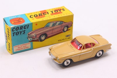 Lot 1646 - Corgi Toys No 228 Volvo P1800 comprising a tan...