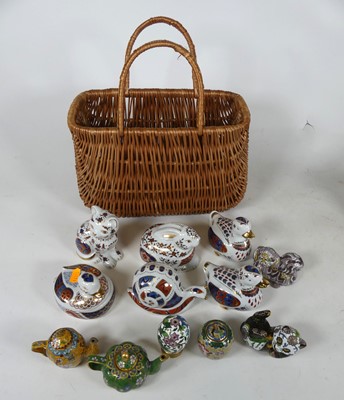 Lot 149 - A collection of porcelain animal paperweights,...