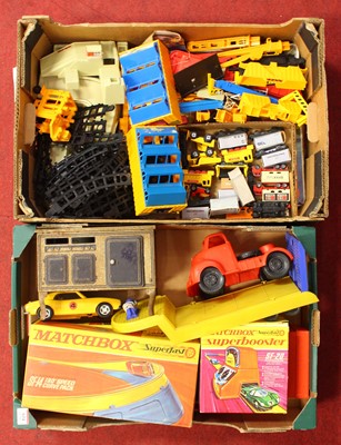 Lot 634 - Two trays containing various matchbox toys and...