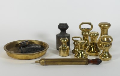 Lot 170 - A collection of weights, to include brass bell...