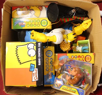 Lot 638 - A large collection of Simpsons action figures,...