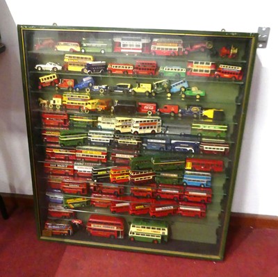 Lot 598 - A large wooden glazed display case, containing...
