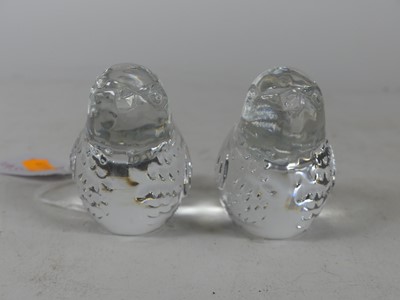 Lot 177 - A pair of moulded glass paperweights in the...