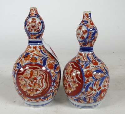 Lot 185 - A pair of Japanese imari porcelain vases, of...
