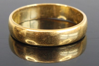 Lot 318 - A 22ct gold court shaped wedding band, sponsor...