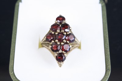 Lot 320 - A modern 9ct gold garnet set lozenge shaped...