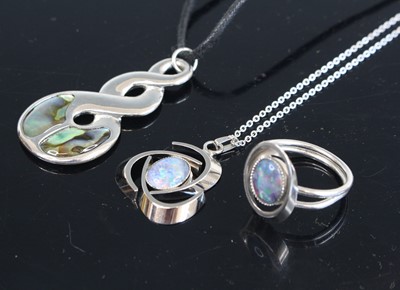 Lot 321 - A contemporary white metal and opal set...