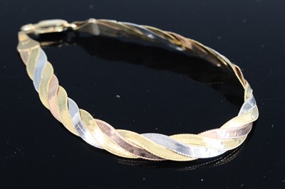 Lot 325 - A modern 9ct three-colour gold flatlink...