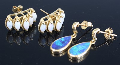 Lot 333 - A pair of modern 14ct gold and opal cabochon...
