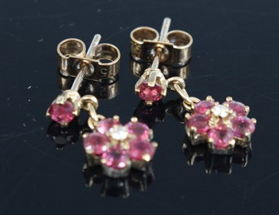Lot 334 - A pair of 9ct gold ruby and diamond point set...