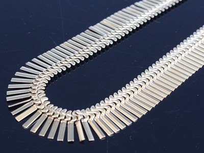 Lot 346 - A modern 9ct gold necklace, arranged as...