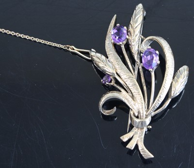 Lot 351 - A modern 9ct gold and amethyst set brooch, as...