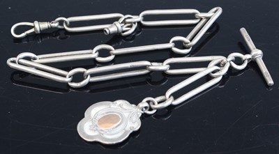 Lot 353 - A silver trombone link watch chain with two...