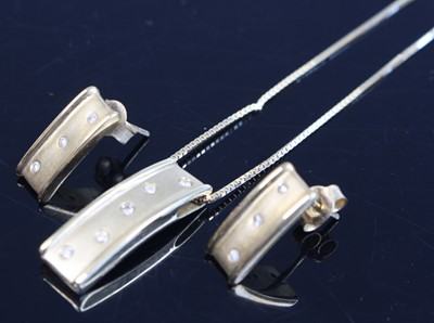 Lot 356 - A pair of 9ct gold diamond point set ear studs...
