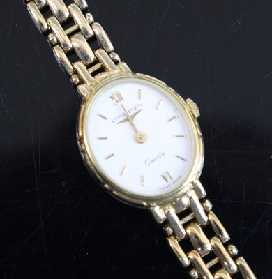 Lot 360 - A Longines lady's quartz bracelet watch, with...