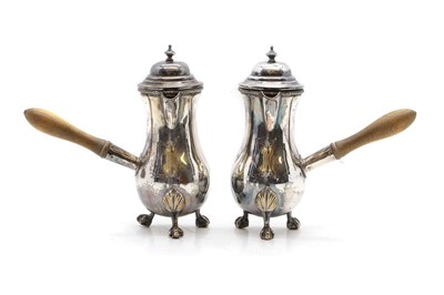 Lot 231 - A pair of Old Sheffield plate chocolate pots,...