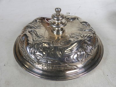 Lot 274 - An Edwardian silver cover, repousse decorated...