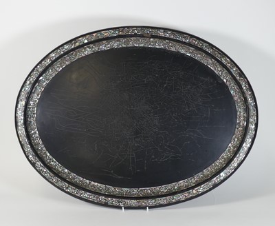 Lot 577 - A large black lacquered tray with mother of...