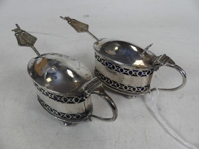 Lot 279 - A pair of George V silver mustards, of oval...