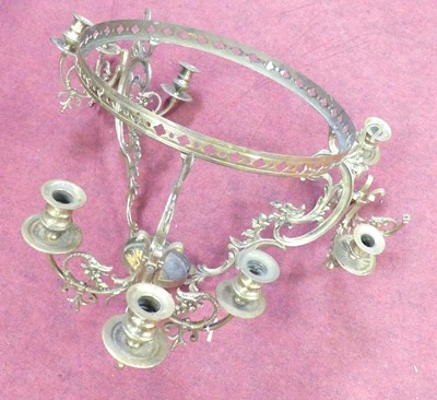 Lot 581 - A brass three branch chandelier