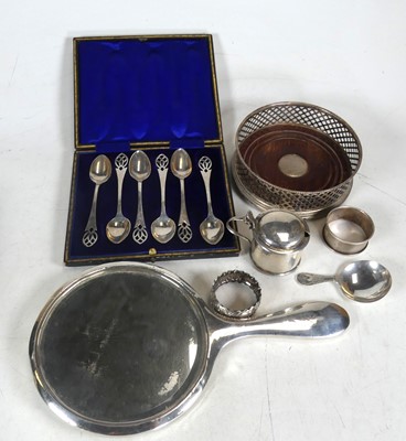 Lot 296 - A silver mounted bottle coaster, having a...