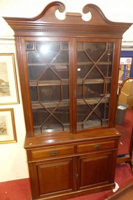 Lot 1139 - An Edwardian mahogany library bookcase, with...