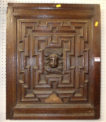 Lot 1147 - A joined and geometric oak square wall panel,...