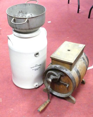 Lot 591 - An oak barrel butterchurn, together with The...