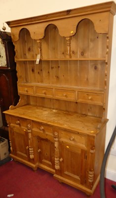 Lot 1185 - A stained pine kitchen dresser, h.205cm, w.141cm