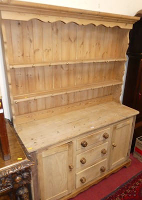 Lot 1189 - A rustic pine round cornered kitchen dresser,...
