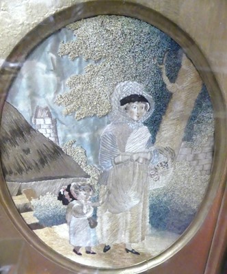 Lot 596 - An oval framed Victorian silkwork picturing...