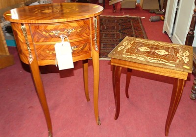 Lot 1200 - A French style oval two-drawer occasional...