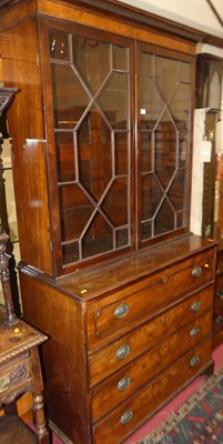 Lot 1202 - A 19th century mahogany secretaire bookcase,...