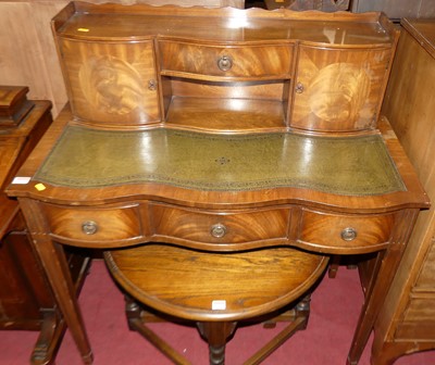Lot 1218 - A contemporary mahogany and leather inset...