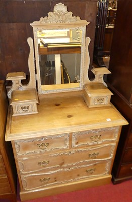 Lot 1223 - A late Victorian pine mirrorback dressing...