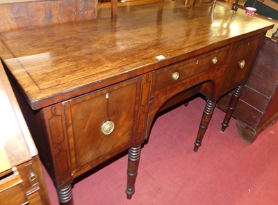 Lot 1231 - A Regency mahogany kneehole sideboard, fitted...