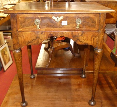 Lot 1232 - A Geo III figured walnut feather and corss...