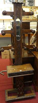 Lot 1234 - A late Victorian relief carved oak hallstand...