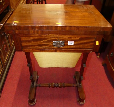 Lot 1242 - A mid-Victorian mahogany fold-over work table,...