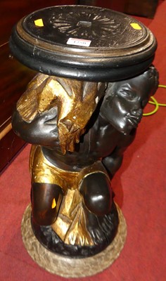 Lot 1250 - A carved polychrome painted and gilt decorated...