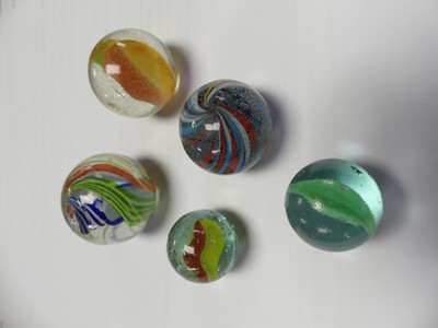Lot 444 - A collection of glass marbles, various designs,...