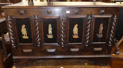 Lot 1269 - An oak four panelled hinge topped blanket...
