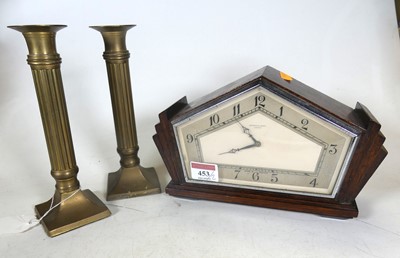 Lot 453 - An Art Deco stained oak mantel clock, of...