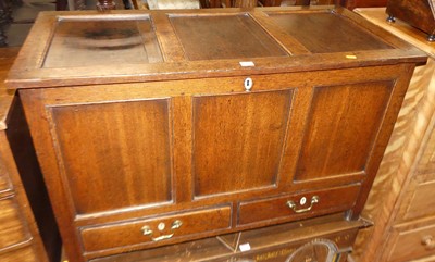 Lot 1275 - An 18th century joined oak three panelled...
