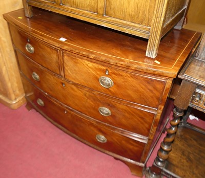 Lot 1281 - A 19th century mahogany low bowfront chest of...