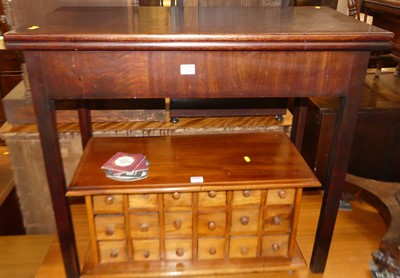 Lot 1290 - A George III mahogany fold-over tea table,...