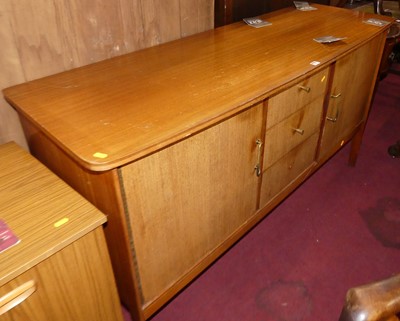 Lot 1293 - A 1960s teak long sideboard by Vansom, w.160cm