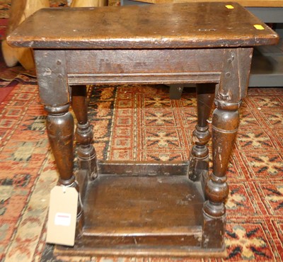 Lot 1298 - An antique joined oak reversible joint stool,...