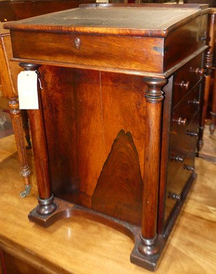Lot 1314 - A George IV rosewood slopefront davenport,...